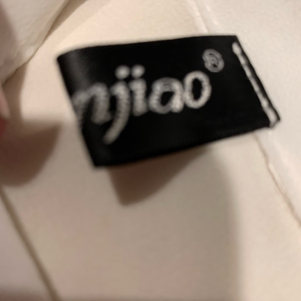 Ziranjio sleeveless asymmetrical angles blouse - Picture 8 of 8